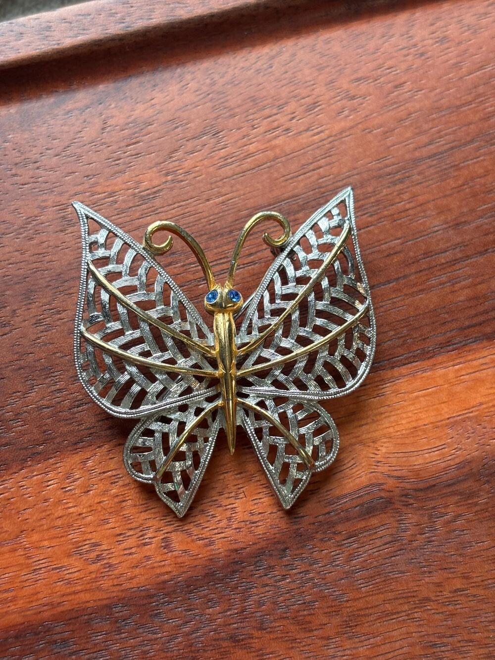 AVON Two-Tone Butterfly Brooch: Silver Gold Filigree, Blue Rhinestone Eyes